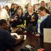 Fans greet Michigan football star Desmond Howard during an autograph signing at the M Den on Friday.  Melanie Maxwell I AnnArbor.com